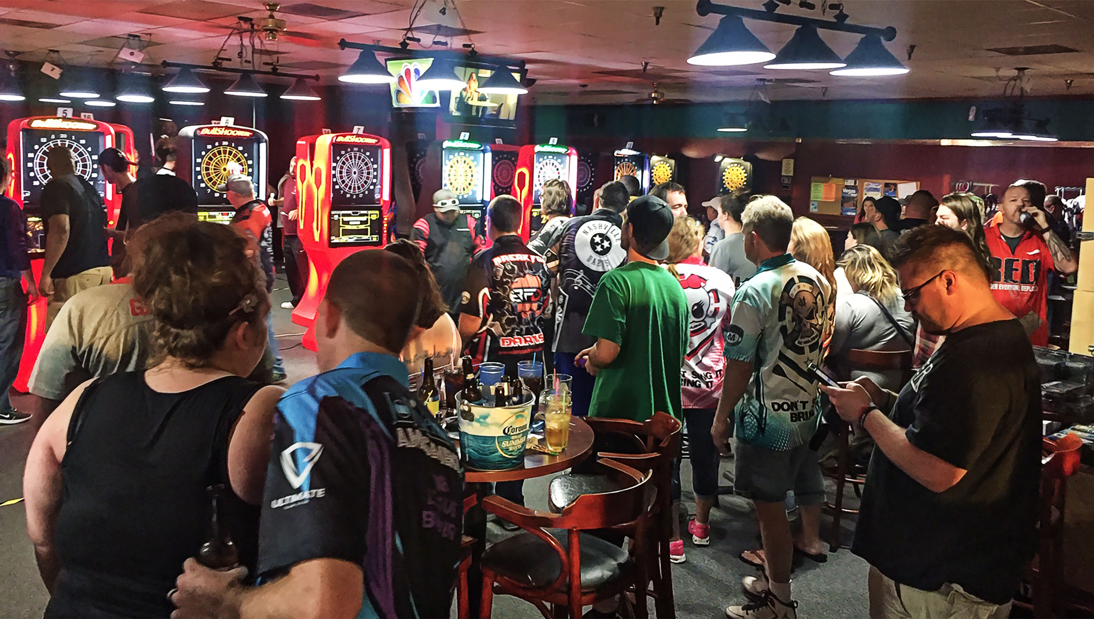 players in dart tournament
